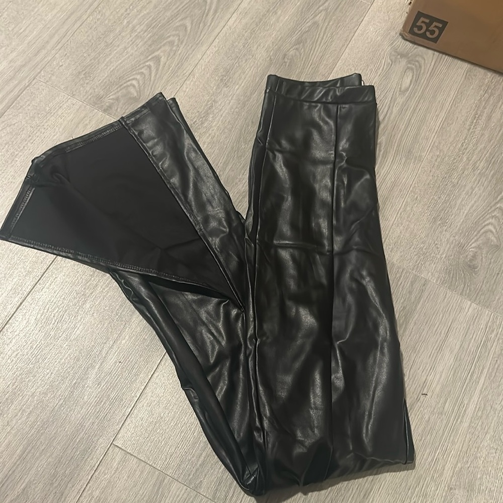 Split hem faux leather pants
